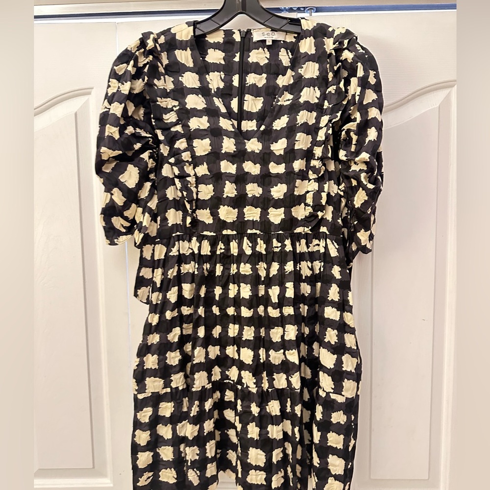 Sea NY mini dress with puff sleeve detail.